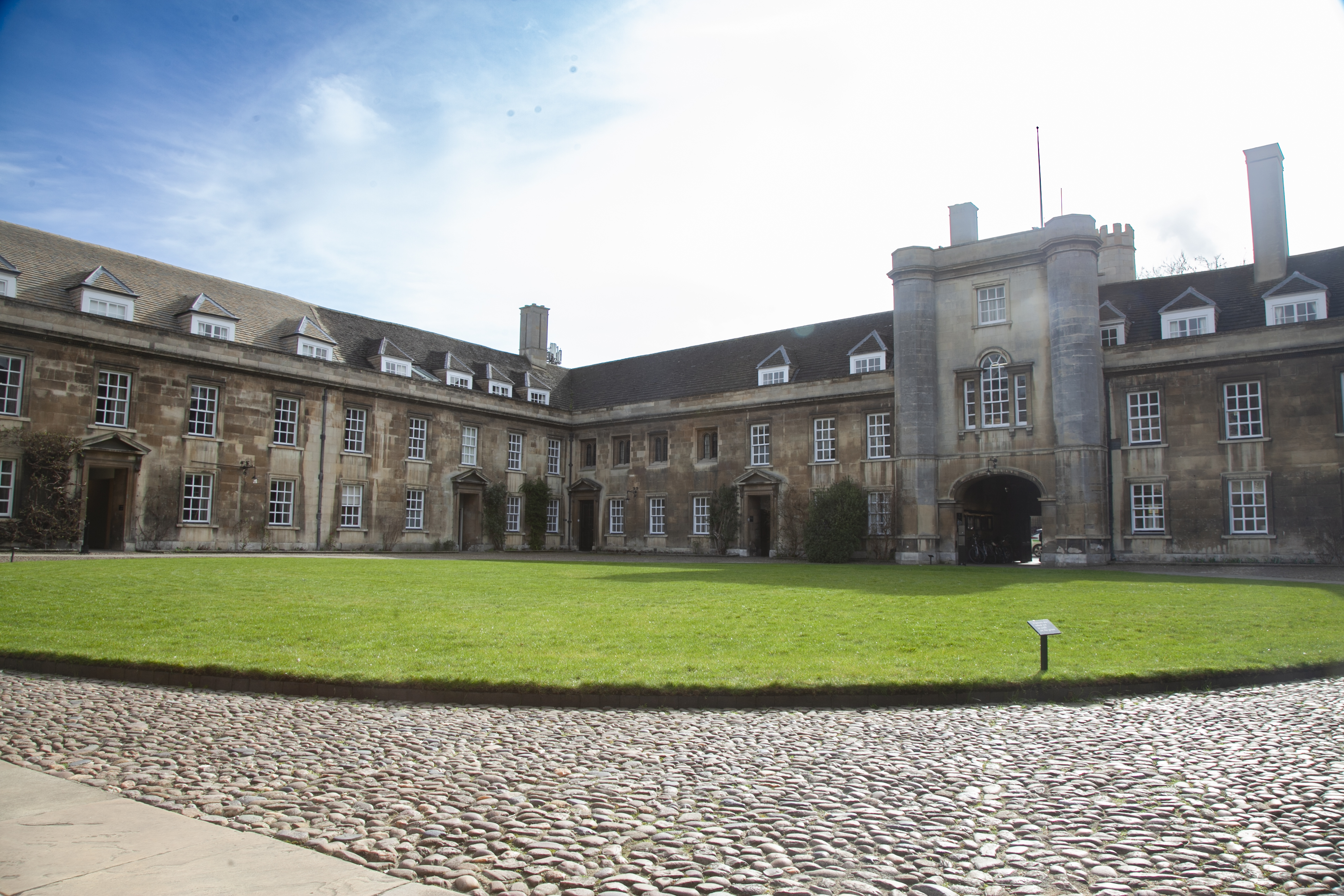 Buildings around a grass courtyard