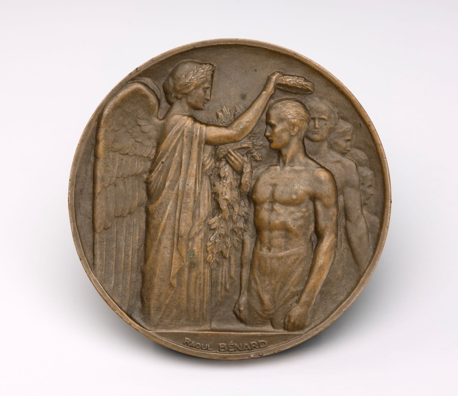 Medal with two figures