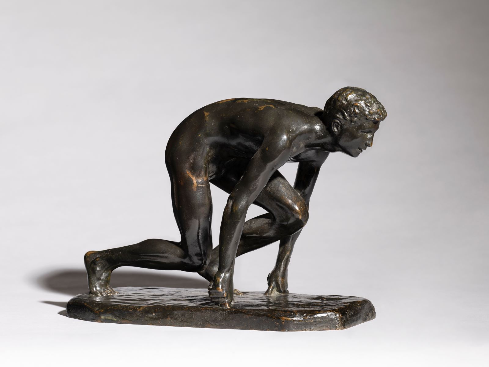 Bronze of crouching runner