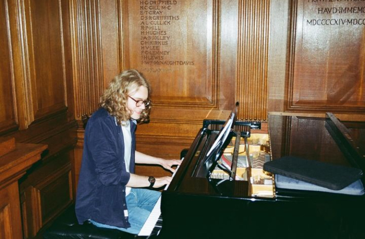 Person playing a piano