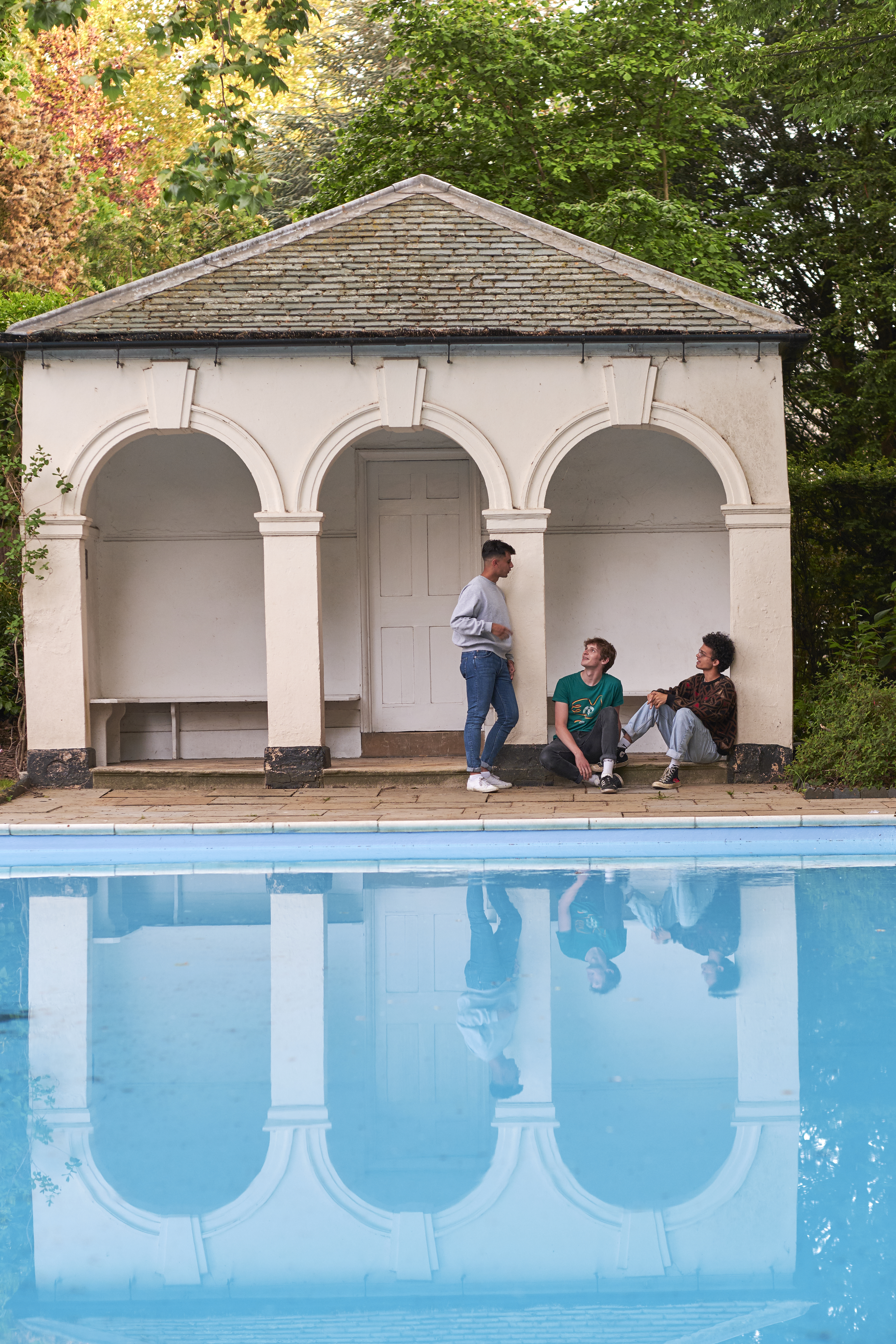 "Students by the pool"