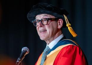 Person in red academic robes