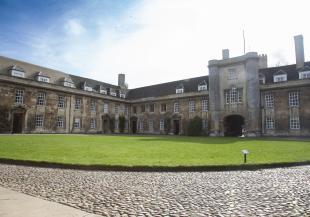 Buildings around a grass courtyard