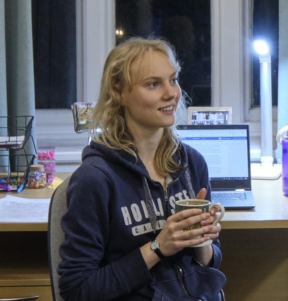 Student with cup of tea