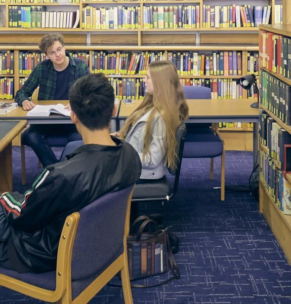 students in library