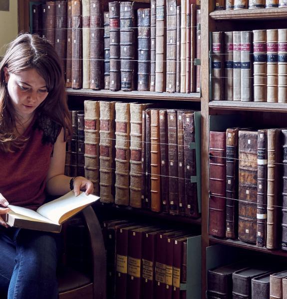 Student reading in the Old Library