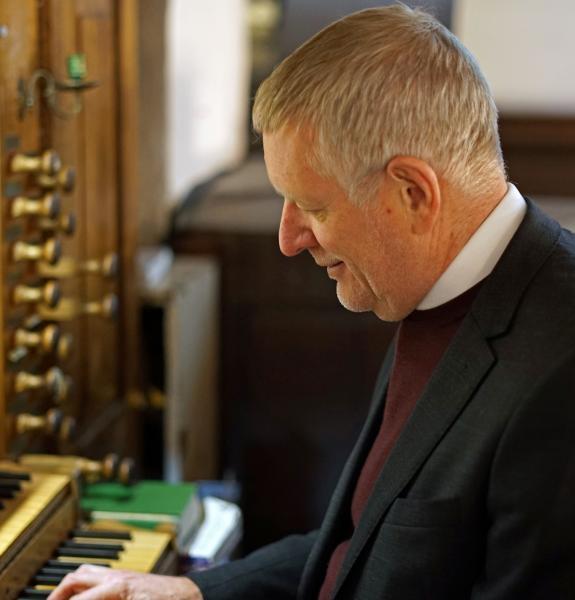 Person playing an organ